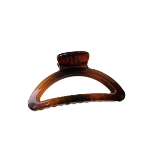 Large amber tortoiseshell resin hair claw clip with minimalist square design for women