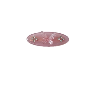Sweet pink oval hair clip featuring a 3D butterfly and sparkling faux diamonds