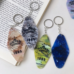 Colorful diamond acrylic keychains with vintage marble textures and outdoor motifs