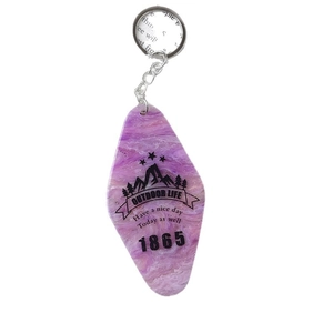 Vintage purple marbled acrylic hotel key tag with outdoor mountain pattern and metal ring