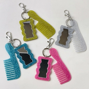 Glitter acrylic mini comb and mirror keychain set in four vibrant colors with metal clips