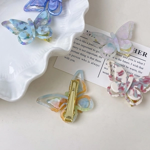 Lot de barrettes papillon en acétate marbré coloré avec base bec de canard dorée
