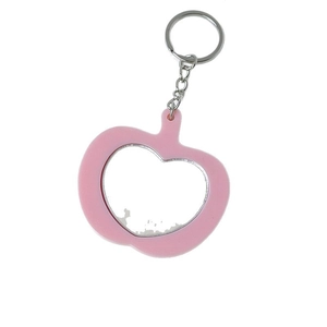 Llavero espejo de bolsillo con forma de manzana rosa y anillo de metal plateado