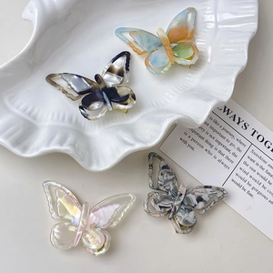 Barrettes à cheveux papillon en acétate chic avec motifs marbrés et irisés pour femmes