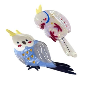 Cartoon bird acetate hair claw clips in blue and pearlescent white for elegant styling