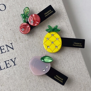 Chic rhinestone fruit hair clips including cherry, pineapple and peach shapes