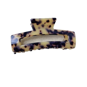 Large acetate hair claw clip with classic tortoiseshell pattern in a hollow rectangle design