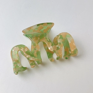 Green and pink marble patterned hair claw clip for women's elegant hairstyling