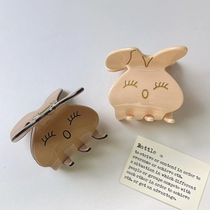 Pinces à cheveux lapin mignonnes en acétate beige et marron avec finition lisse