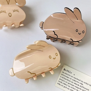 Pinces à cheveux lapin mignonnes en rose, beige et champagne avec fini brillant