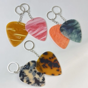 Marble texture acrylic teardrop keychain set in tortoise and vibrant water ripple patterns