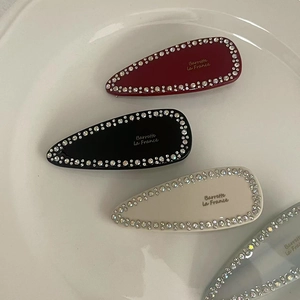 Elegant rhinestone acetate hair clips in red, black and white with gold lettering