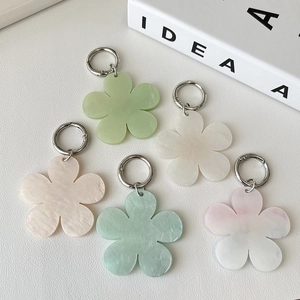 Colorful acrylic sunflower keychains with pearlescent finish and silver spring rings