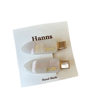 Elegant white marble texture acetate hair clips with gold metal base on display card
