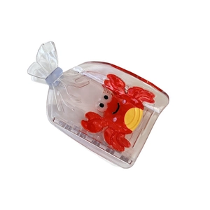 Pince à cheveux créative en forme de sac transparent avec un motif de crabe rouge