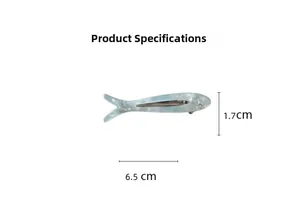 Detail view of small fish hair clip with 6.5cm length dimensions and marble texture
