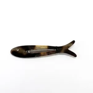 Y2K cute fish-shaped acetate hair clip with vintage tortoiseshell pattern on white background