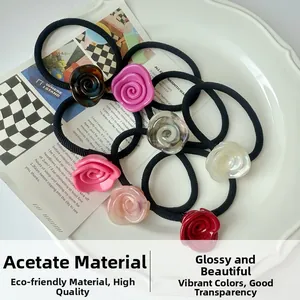 Detailed close-up of elegant acetate rose flower elastic hair ties in multiple colors