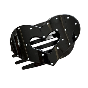 Elegante pinza para el cabello de corazón negro con lunares blancos para mujer