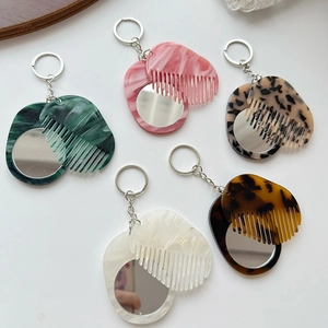 Portable mini mirror and comb keychain set in marble and tortoise shell resin patterns
