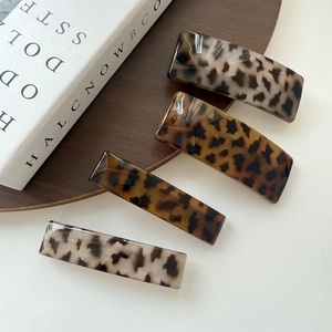 Set of four French vintage leopard print acrylic square hair clips in tortoiseshell patterns