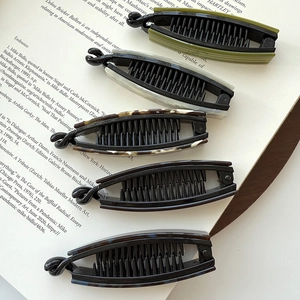Set of five elegant acetate banana clips in olive, pearl, marble and tortoise patterns