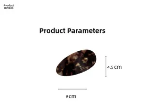 Detail view of oval acetate hair clip with tortoiseshell pattern and 9cm x 4.5cm dimensions