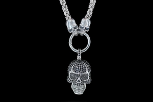 Detail of gothic skull pendant with black rhinestones on heavy Byzantine chain