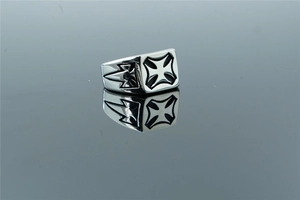 Detail shot of men's stainless steel punk ring featuring an iron cross on a square top