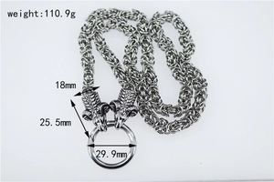 Detail view of heavy vintage silver chain with double goat head pendant and measurements