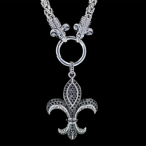 Gothic silver fleur-de-lis pendant necklace with pavé black stones and ram head link