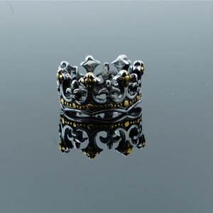 Vintage silver and gold crown ring in stainless steel with hollow carved details