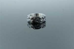 Macro shot of rotatable vintage leaf pattern on punk style stainless steel ring