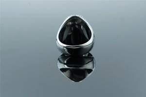 Detailed view of polished men's barber ring showing wide band and reflective metal finish