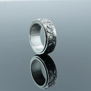 Vintage gothic rotatable steel ring featuring unique eye patterns and distressed silver finish