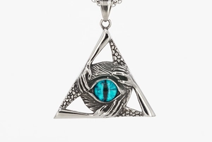 Detailed view of Gothic silver triangle pendant with blue dragon eye and bone textures