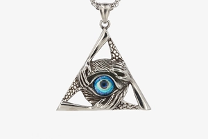 Macro shot of gothic silver triangle pendant with blue eyeball and hand claws design