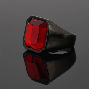 Men's vintage ring featuring a rectangular red gemstone on a sleek black stainless steel band