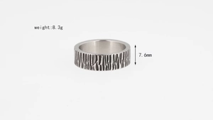 Detail of 7.6mm wide mountain wood texture ring with 8.3g vintage rustic steel finish