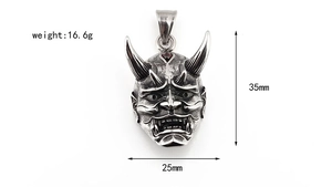 Detailed size chart of vintage Prajna pendant with garnet inlay and punk skull design