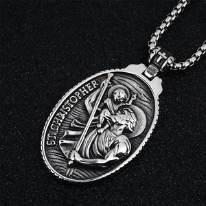 Vintage St. Christopher medallion necklace with cross detail and stainless steel box chain