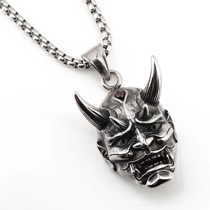 Gothic Hannya mask necklace in stainless steel with a red garnet stone inlay for men