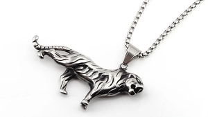 Detailed view of punk tiger pendant in silver stainless steel with box chain necklace