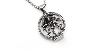 Detail showing vintage Shiva medallion with zirconia stones and boxed chain