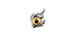 Macro shot of mystical brown dragon eye pendant with vintage cracked metal texture