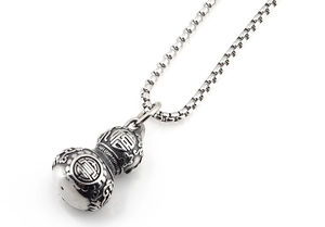 Detailed close-up of retro stainless steel gourd pendant with Fu and Shou engraving