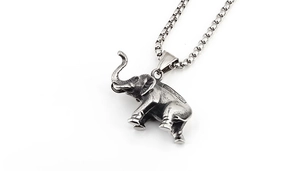 Close-up of vintage titanium steel elephant pendant with detailed texture and box chain