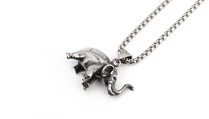 Close-up of vintage titanium steel elephant pendant with detailed texture and box chain