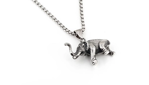 Macro shot of retro stainless steel elephant pendant with detailed skin texture