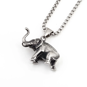 Vintage silver elephant pendant necklace with detailed casting on a classic box chain